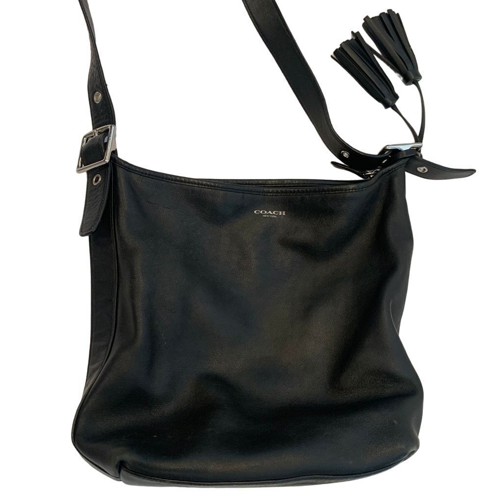 EUC Coach Black Leather Bucket Bag‎ Purse with Tassel Accents Belt Style Strap